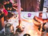 Arab Comfort Food in the U.S: A Journey of Taste and Culture Family enjoying Tunisian shakshouka and Algerian chorba at a dinner table in the US