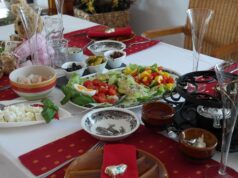 Celebrating Eid Al-Fitr: A Collection of Festive Recipes from the Maghreb Family gathering around traditional Maghreb dishes for Eid Al-Fitr celebration