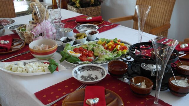 Eid Al-Fitr family meal Maghreb Family gathering around traditional Maghreb dishes for Eid Al-Fitr celebration