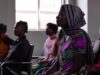 Modern Muslim Fashion: Empowering Styles for Contemporary Women Women in modern Muslim fashion wearing stylish outfits at a fashion event