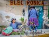 Exploring the Future of Amazigh Culture in Morocco: Challenges and Opportunities Young Amazigh woman in traditional clothing, sitting in a Moroccan market