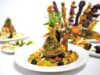 15 Delicious Tunisian Recipes to Embrace the Mediterranean Flavor Woman cooking Tunisian tagine in a sunlit kitchen