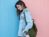 Discovering Modern Fashion Trends for Maghrebi Women: Balancing Tradition and Style Maghrebi woman in a contemporary hijab, wearing a fashionable outfit and holding a fashion magazine