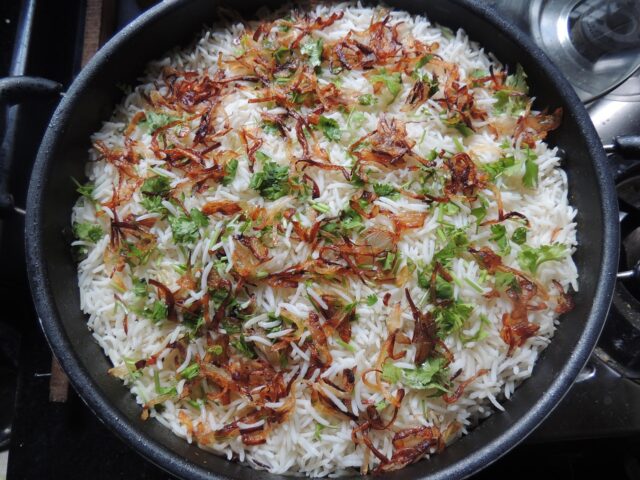 Contemporary Maghrebi Iftar Preparation Women preparing contemporary maghrebi comfort food recipes for iftar