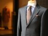 The Impact of Europe’s Unsold Clothes Ban on Moroccan Fashion Industry – HESPRESS English Analysis European clothing racks with 'Unsold' tags, Moroccan fashion designers working on designs
