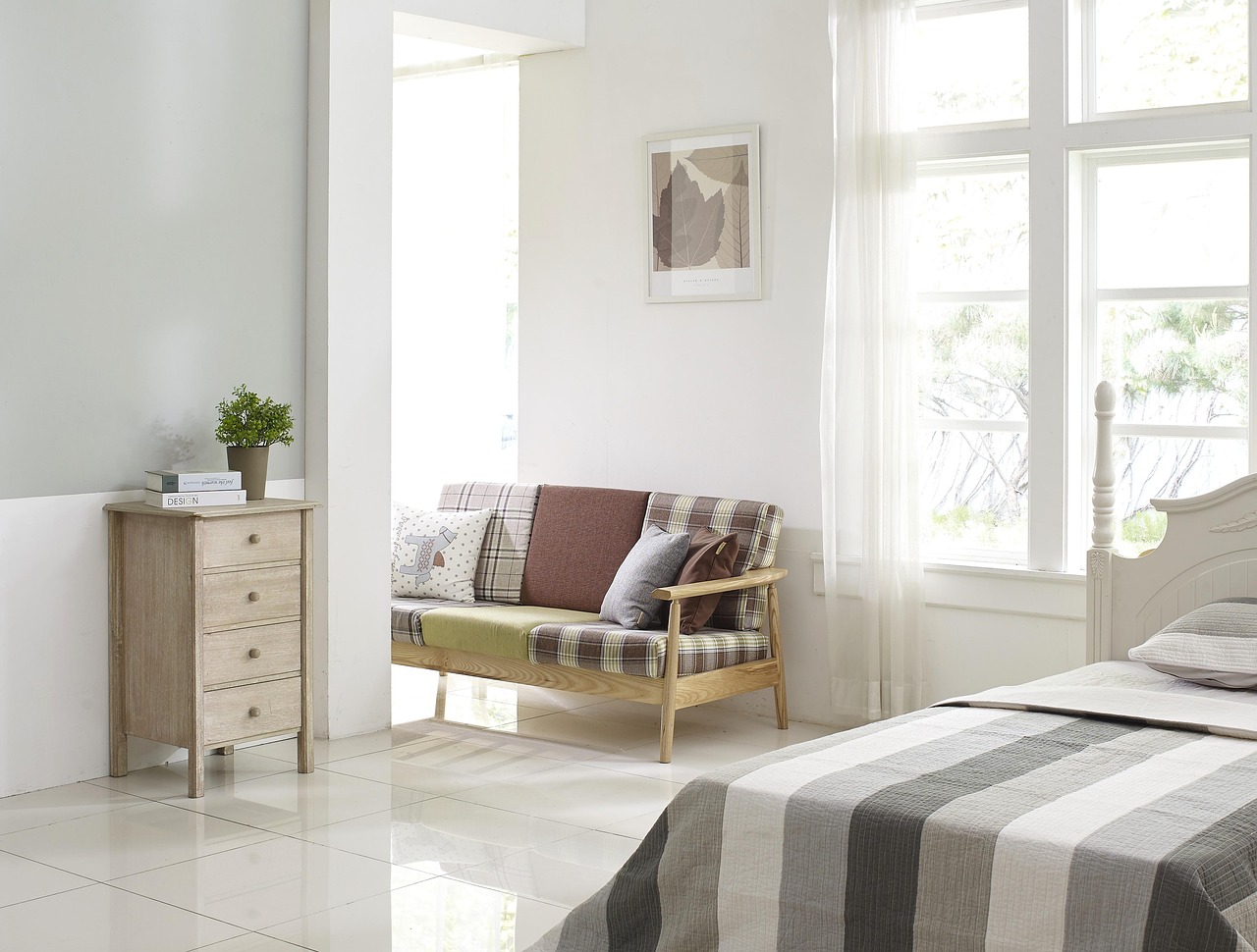 Moroccan-styled living room with Soundous Moufakir sitting on a traditional low table