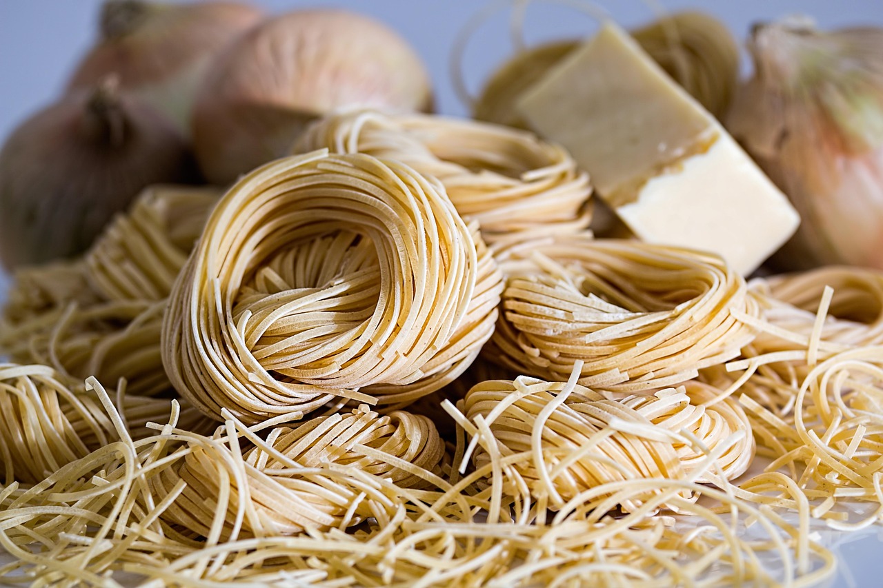 Woman preparing yabrak pasta dish for Passover in Marseille