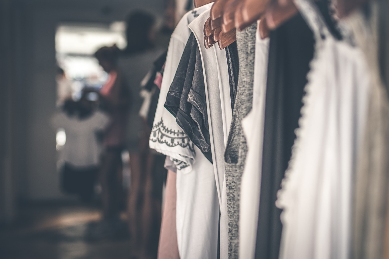 Women in hijab shopping for Islamic clothing at a Maghrebi market