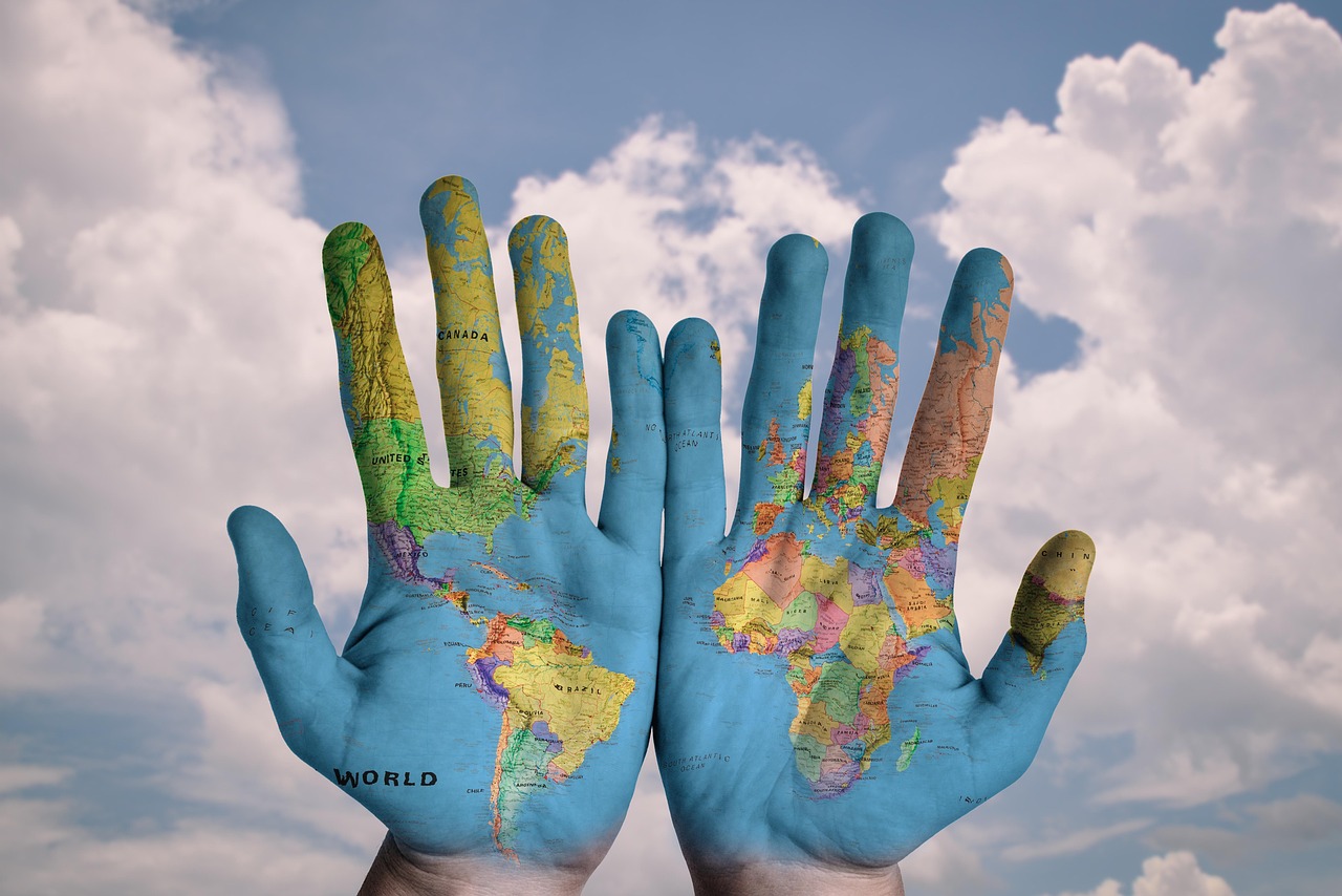 Maghrebi emigrants at a global event, interacting with locals